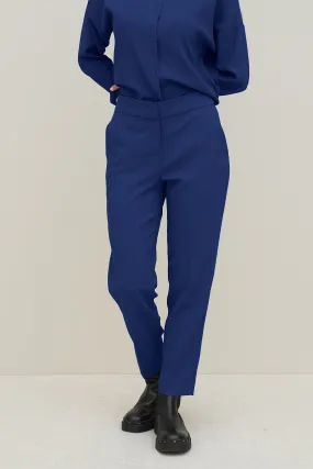 Pantaloni slim fit in crepe di viscosa elasticizzato blu